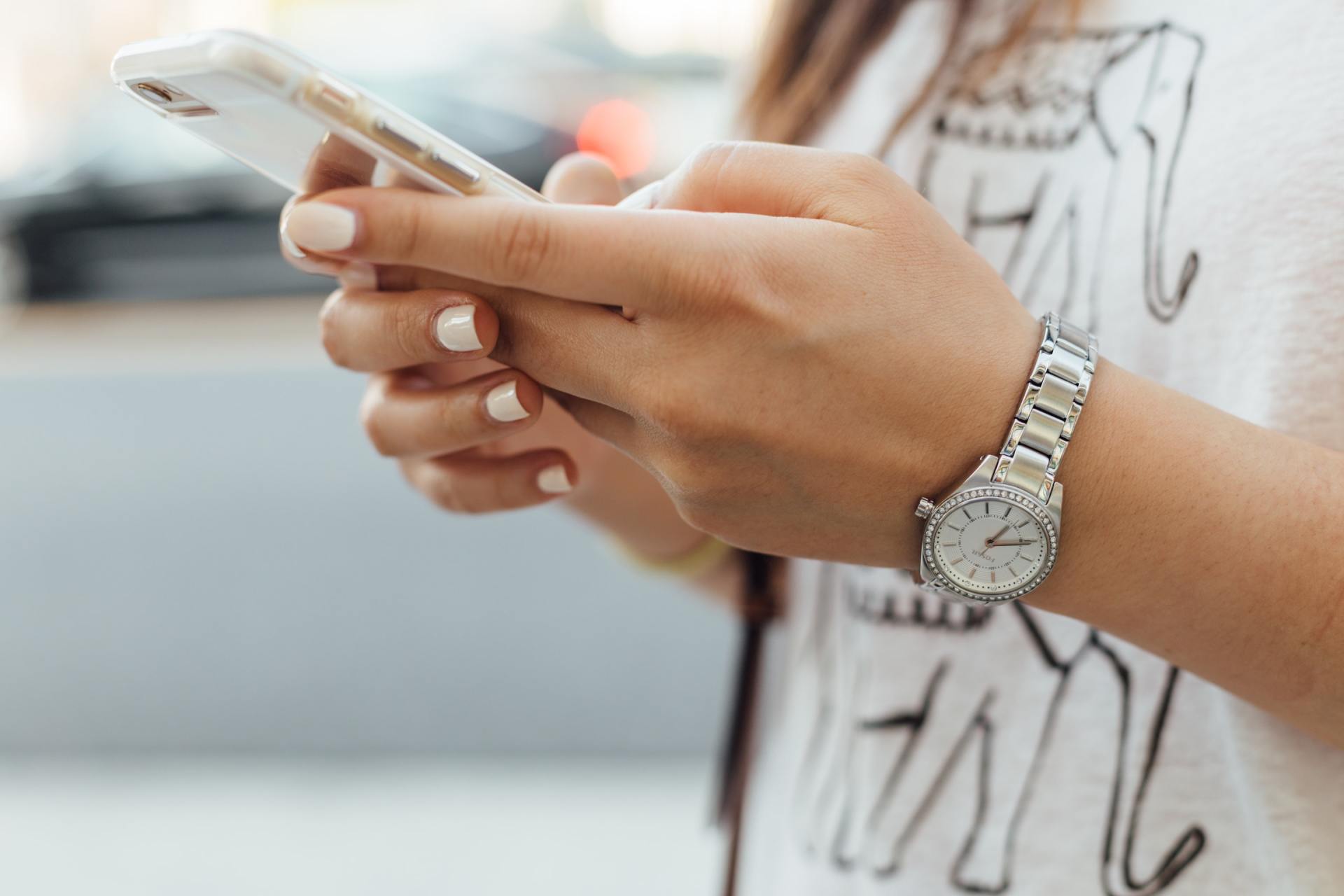 girl holding cell phone