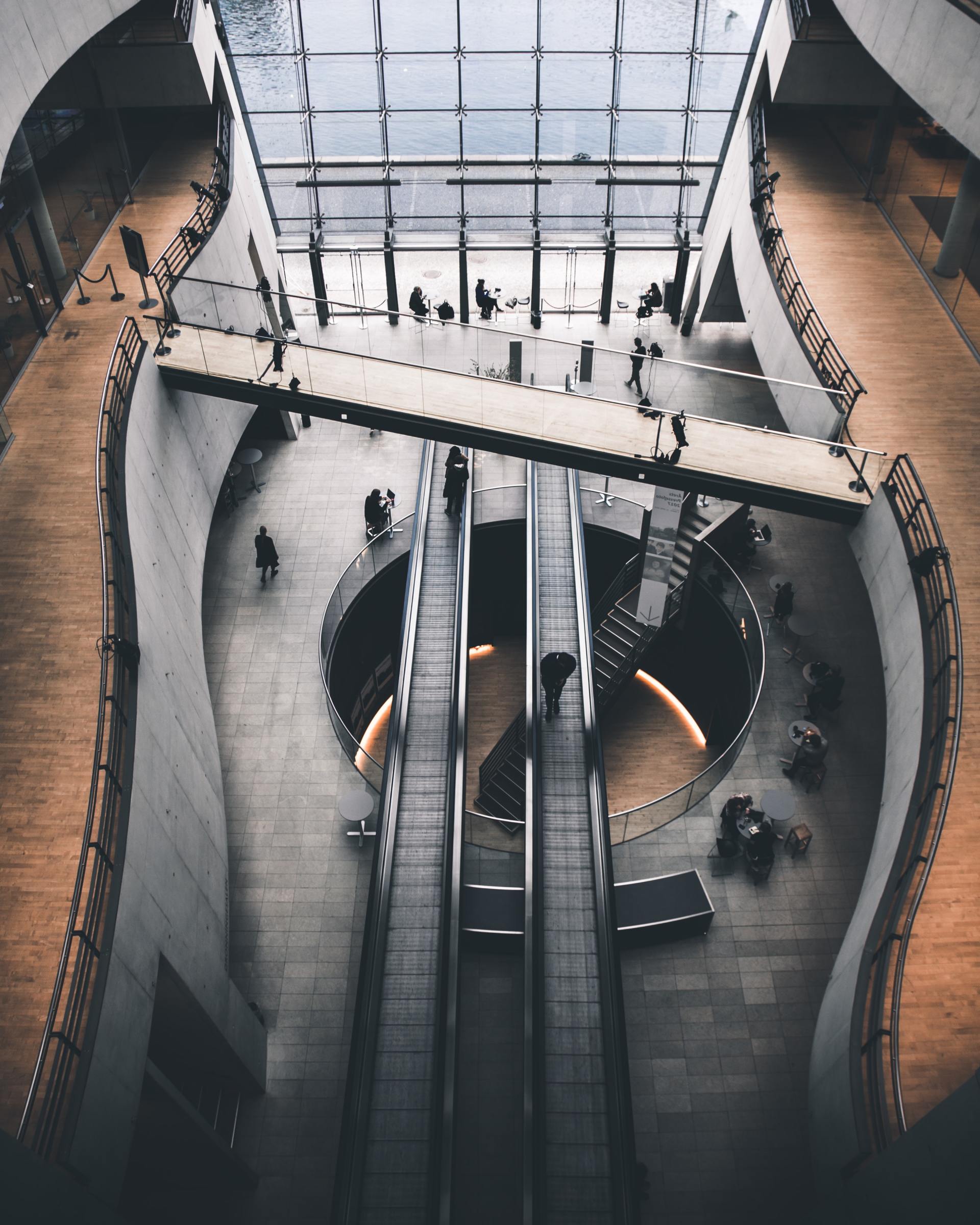 An aerial view of an escalator in a building