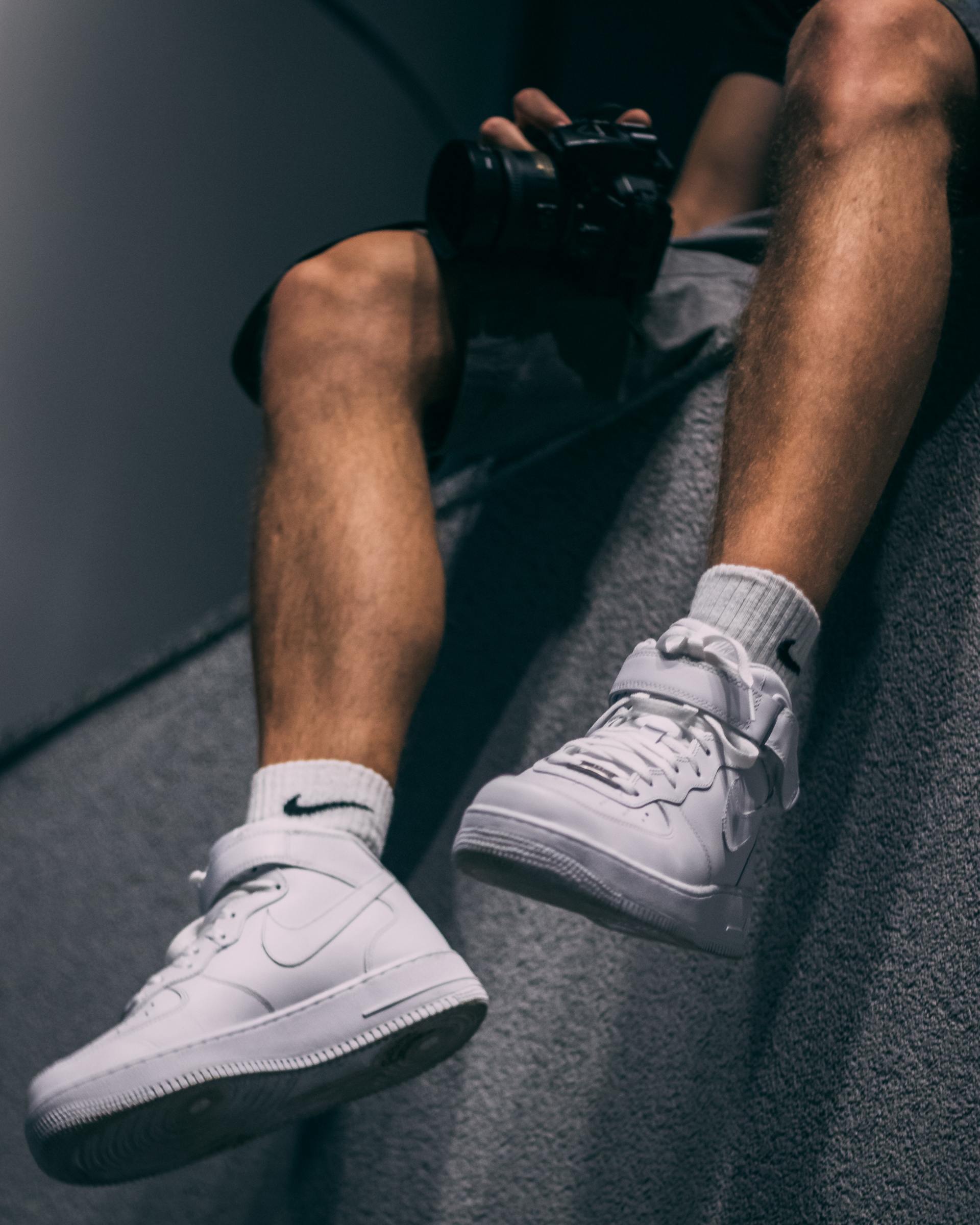 Feet and lower leg in trainers image