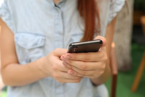 woman using mobile phone