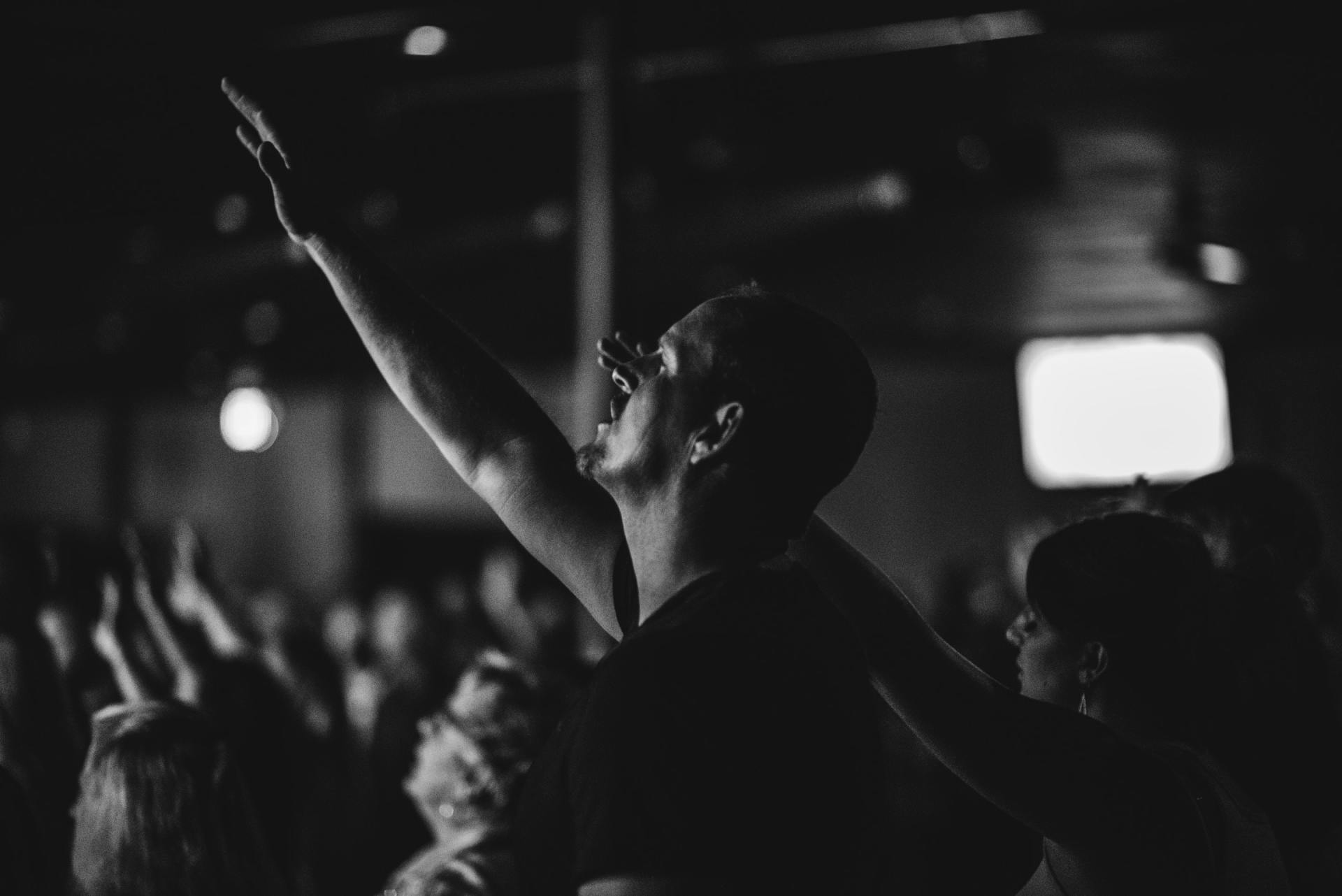 Young Christian Man Worshipping