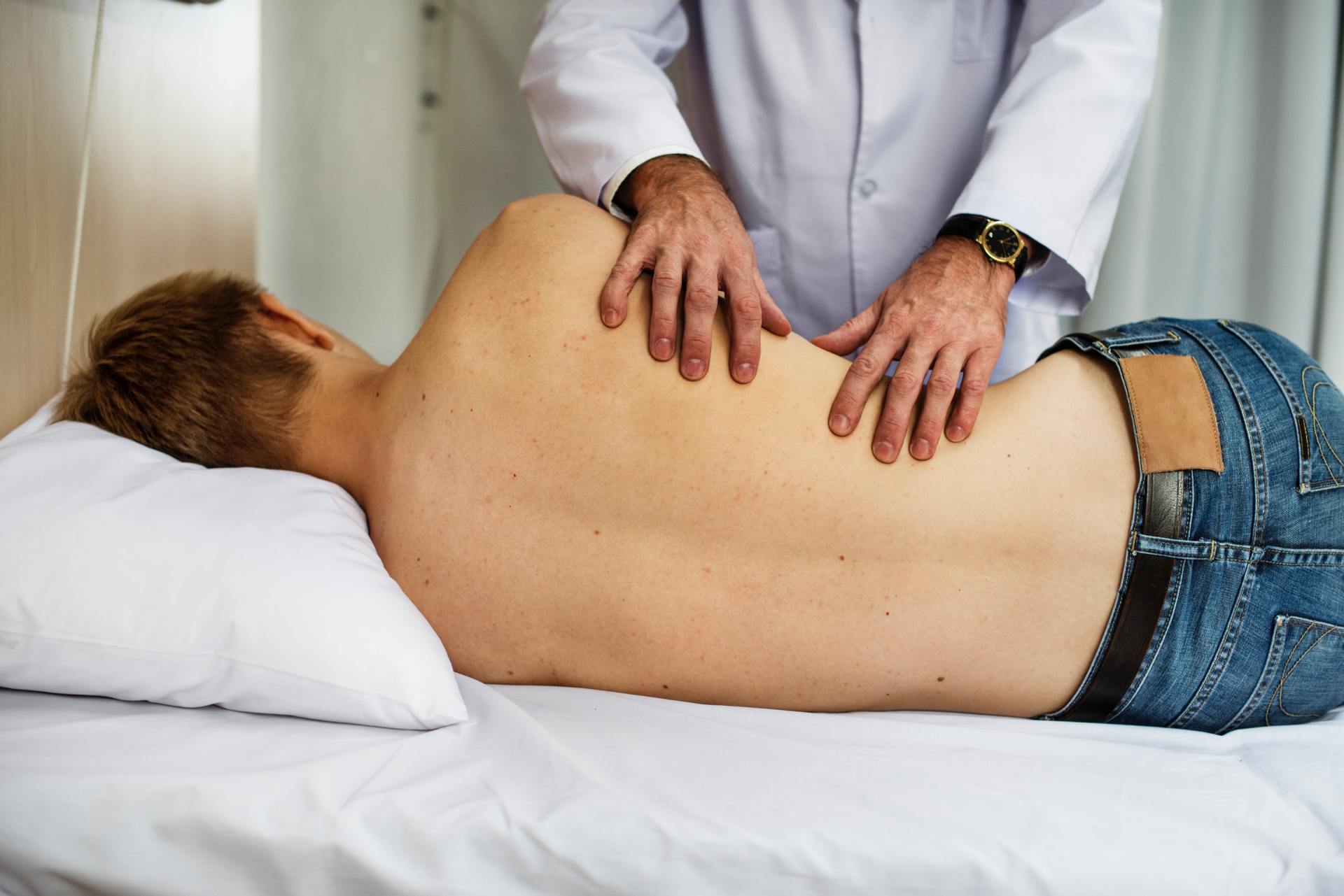 Chiropractor treating Back Pain