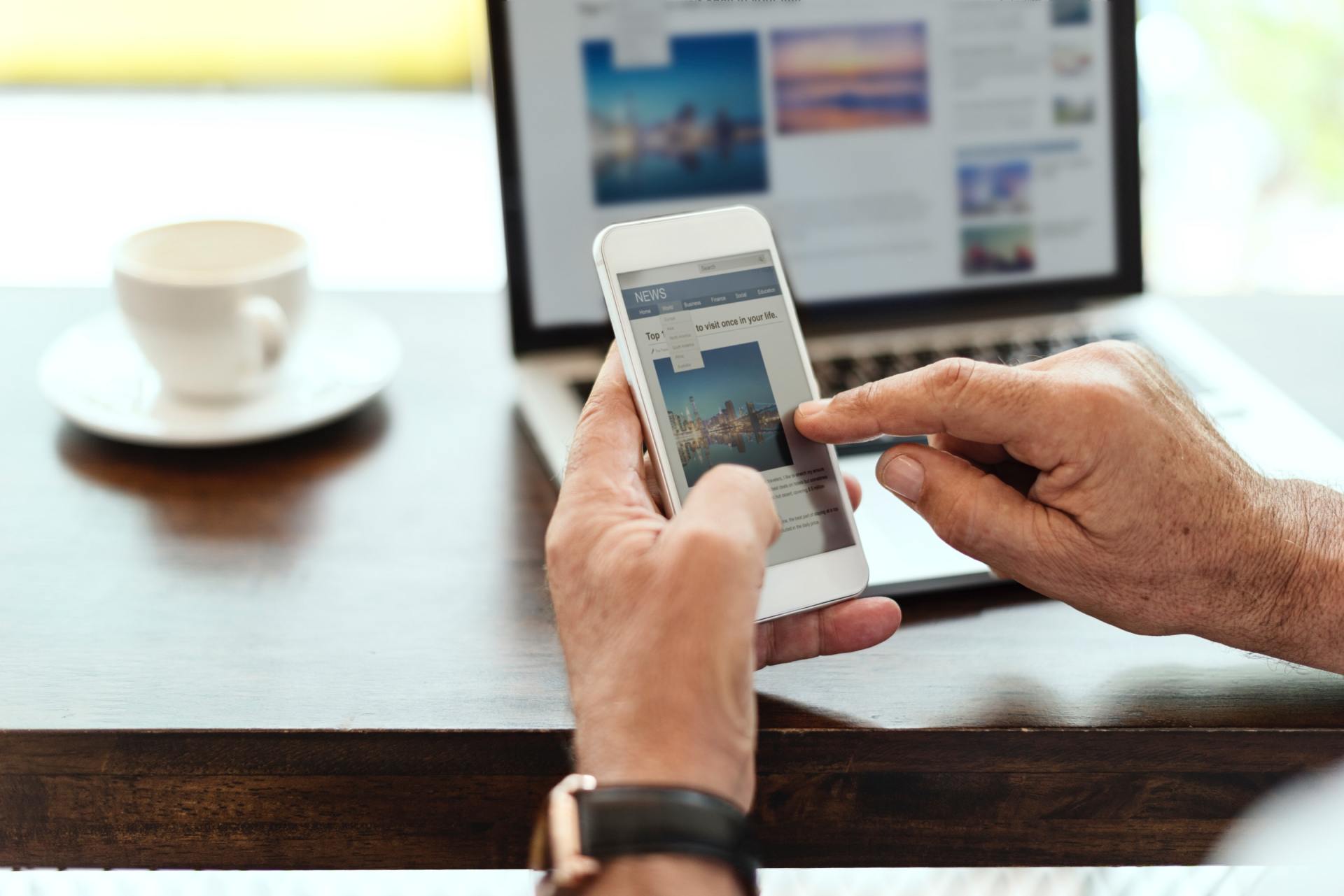 Man scrolling through website on phone