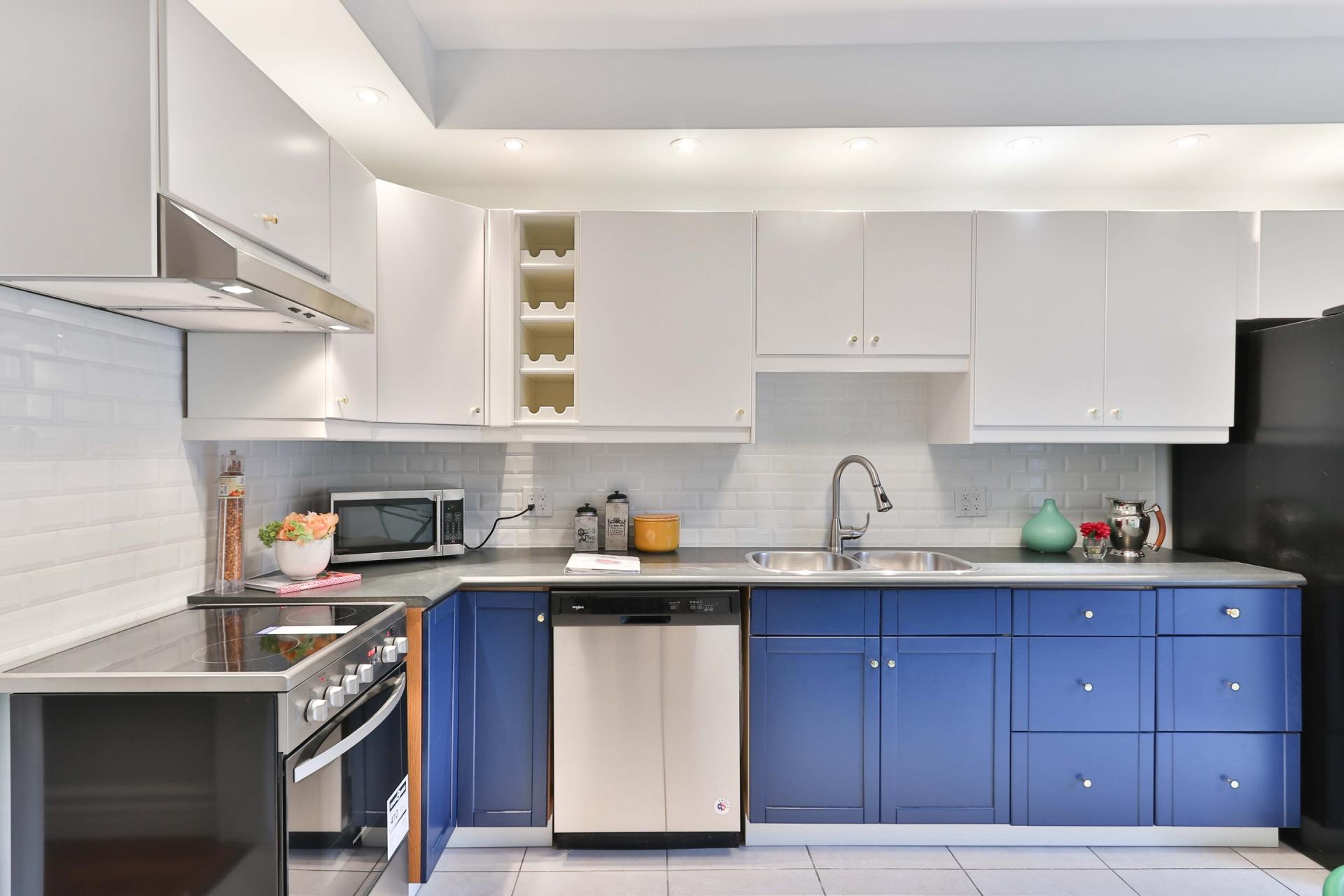 two color blue and white kitchen cabinets