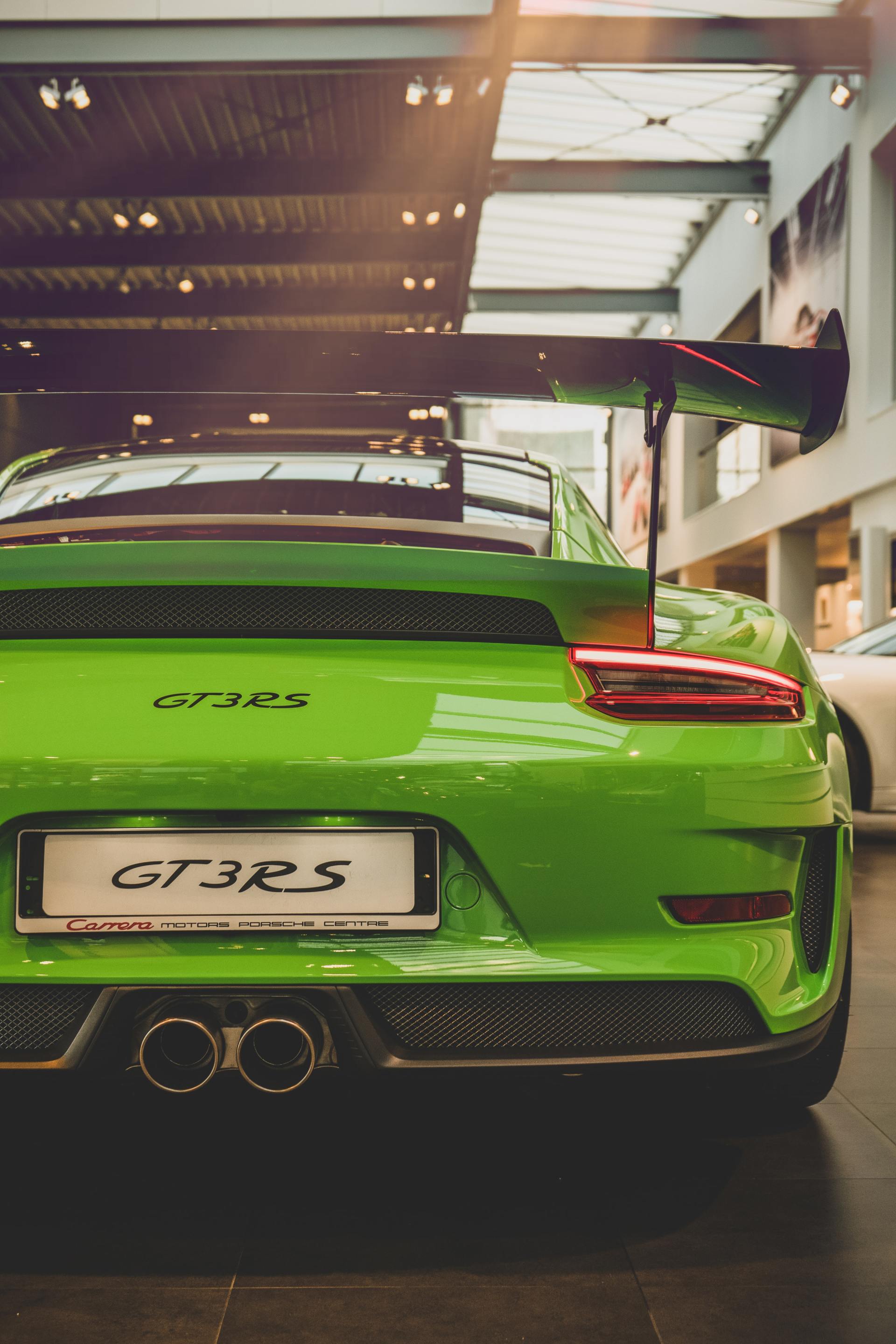 green Porsche GT3RS rear end