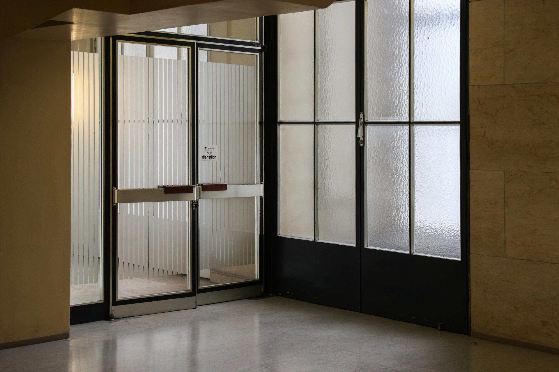 An empty room with a sliding glass door