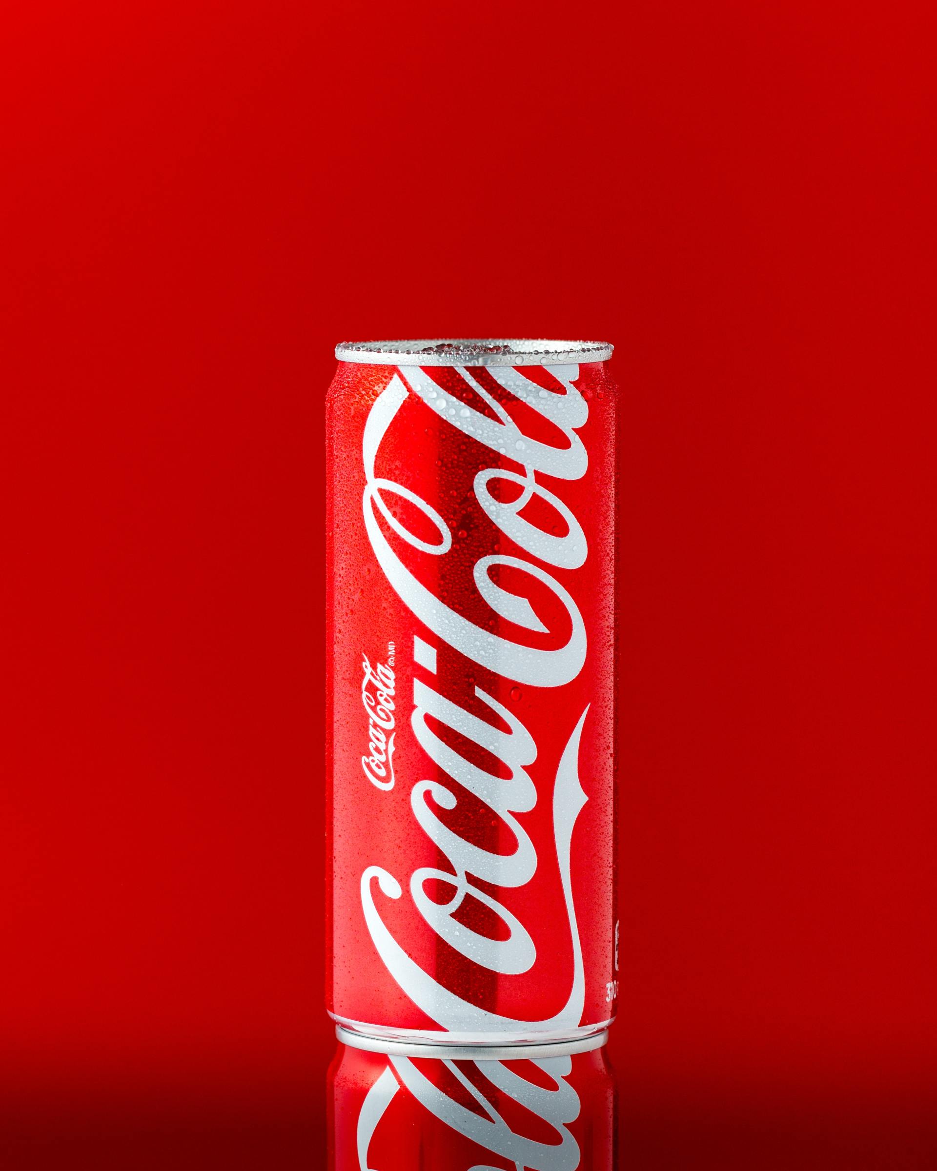 Coca Cola can on red background