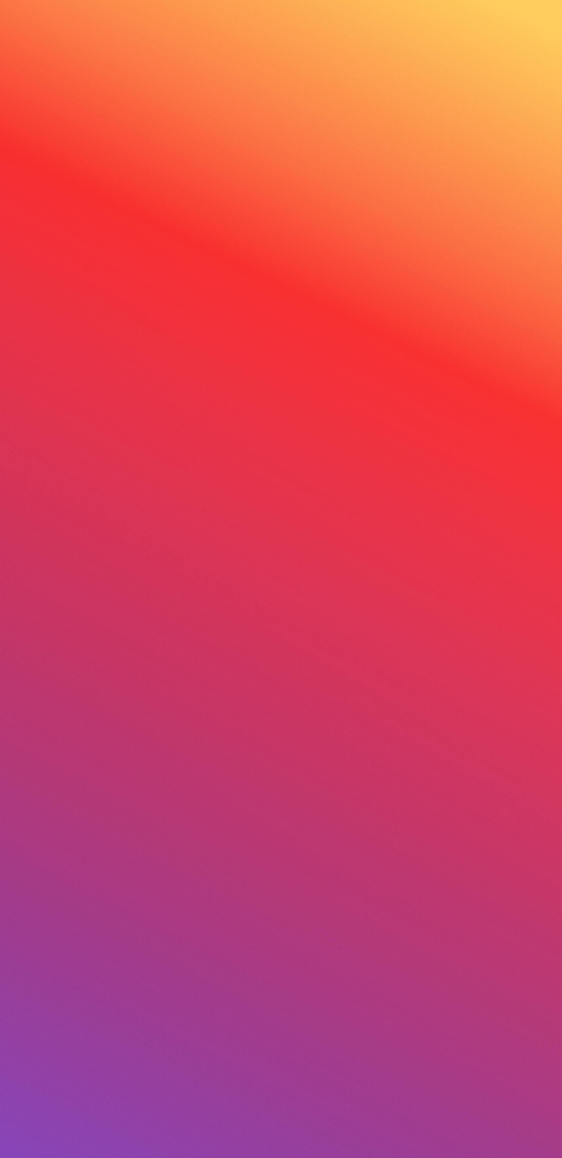 A purple and orange gradient background with a blurred effect.