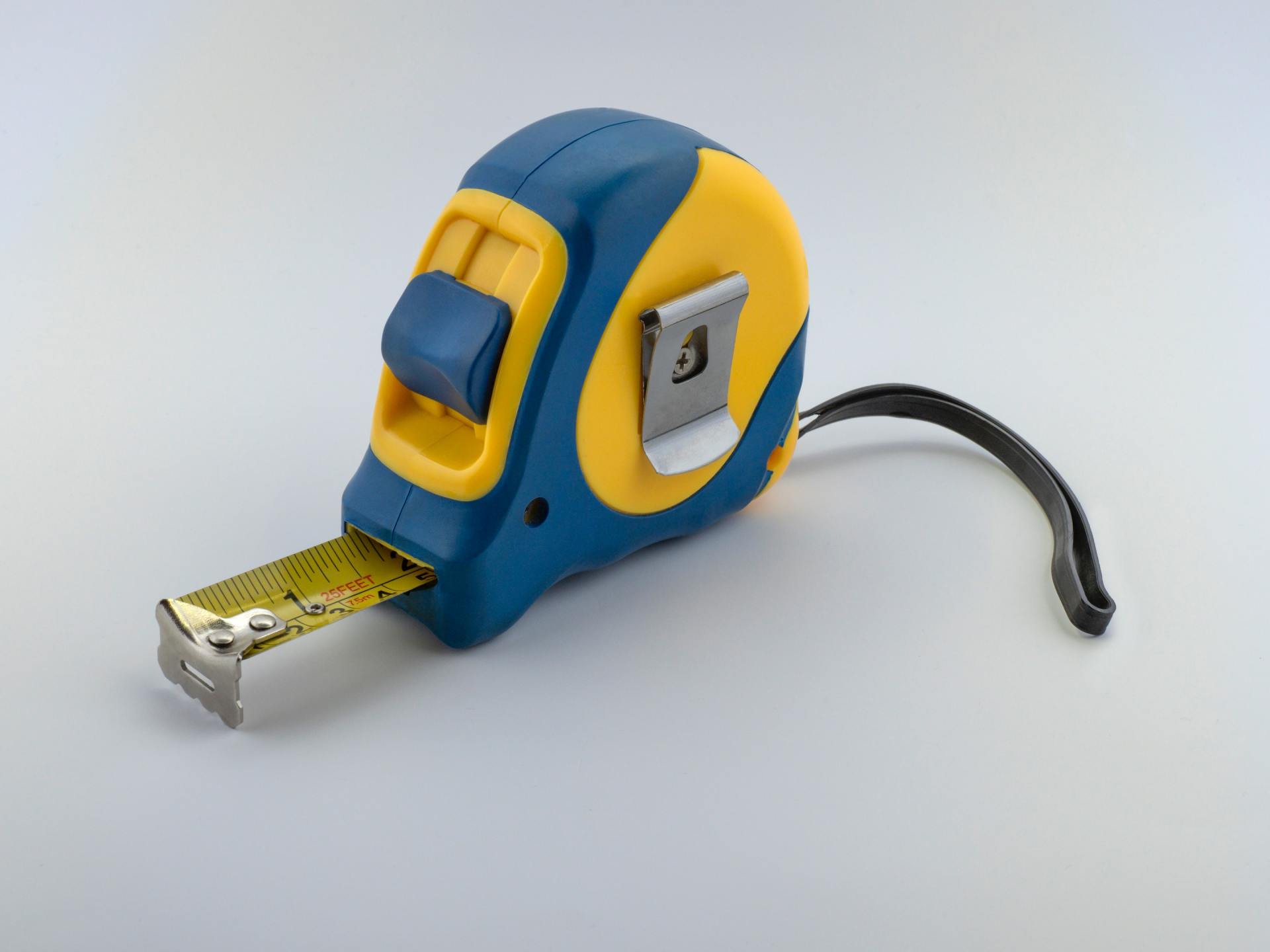 yellow and blue retractable tape measure