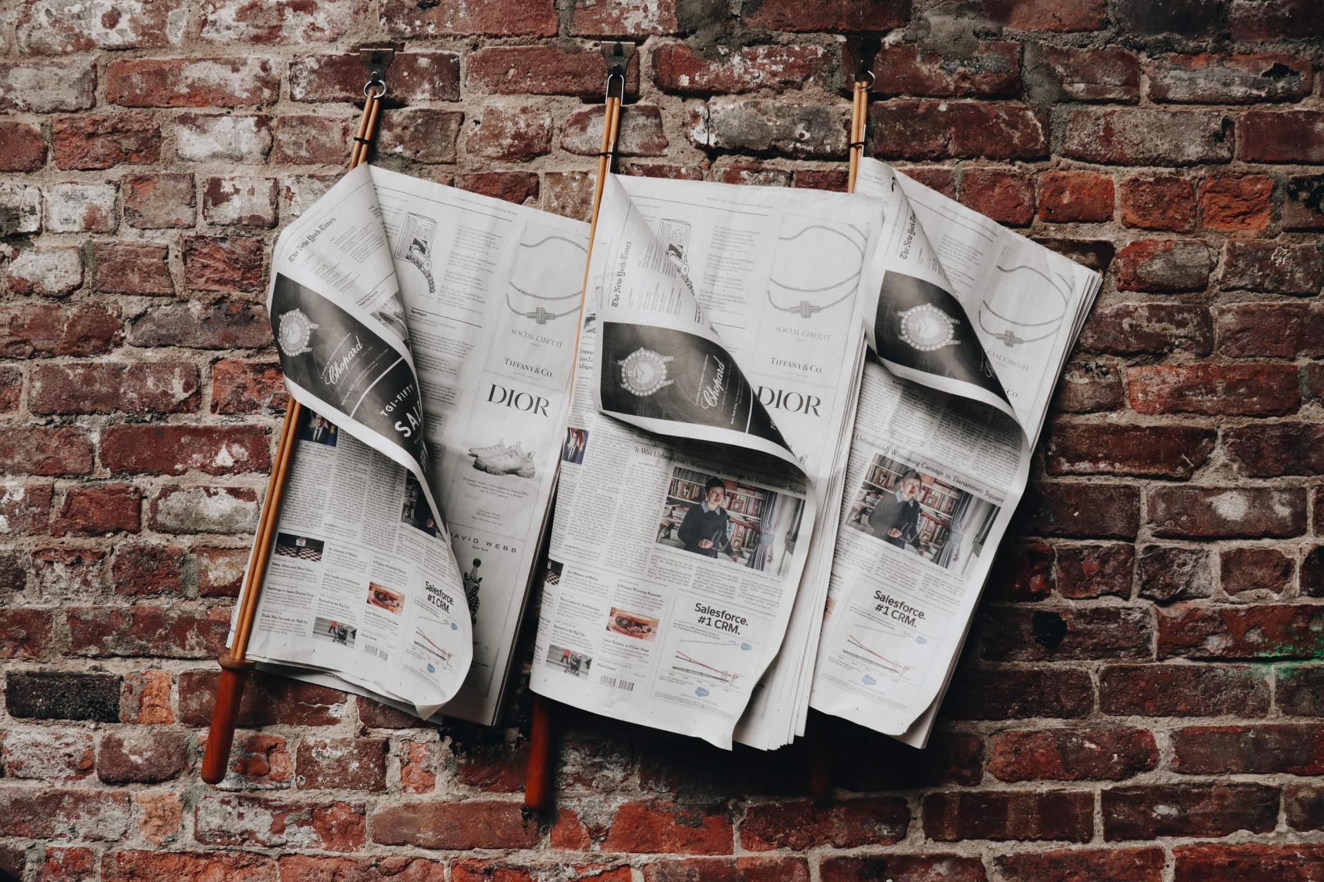 newspapers_hanging_on_wall