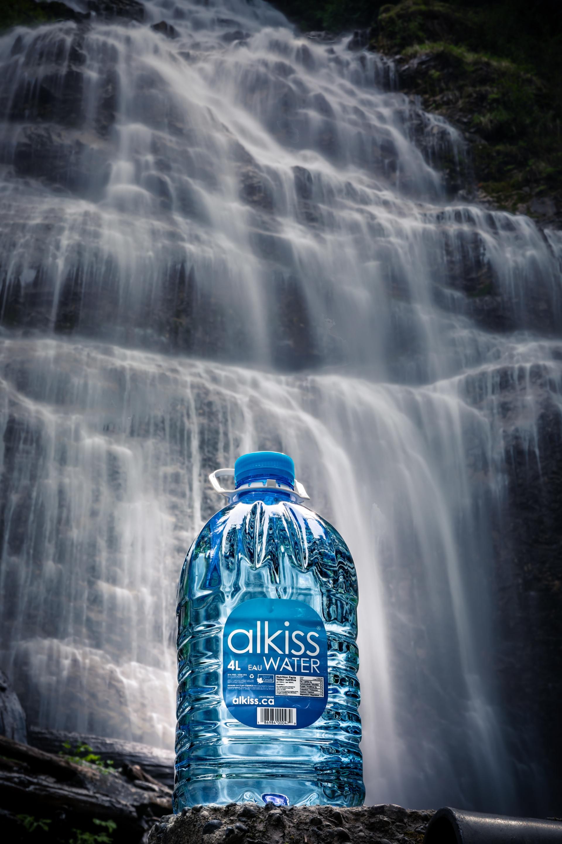 water bottle near a waterfall