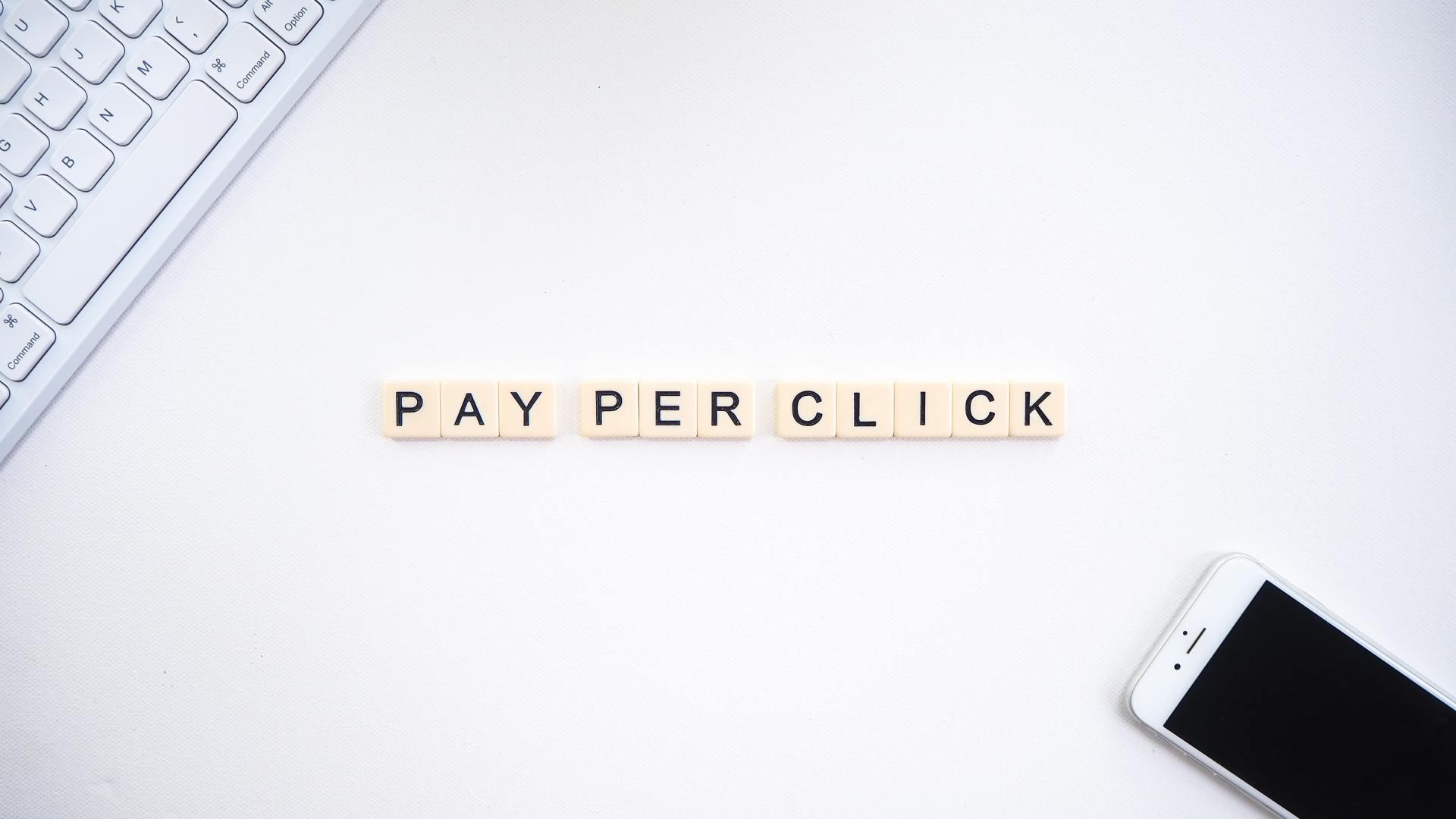 pay per click spelled out on scrabble tiles