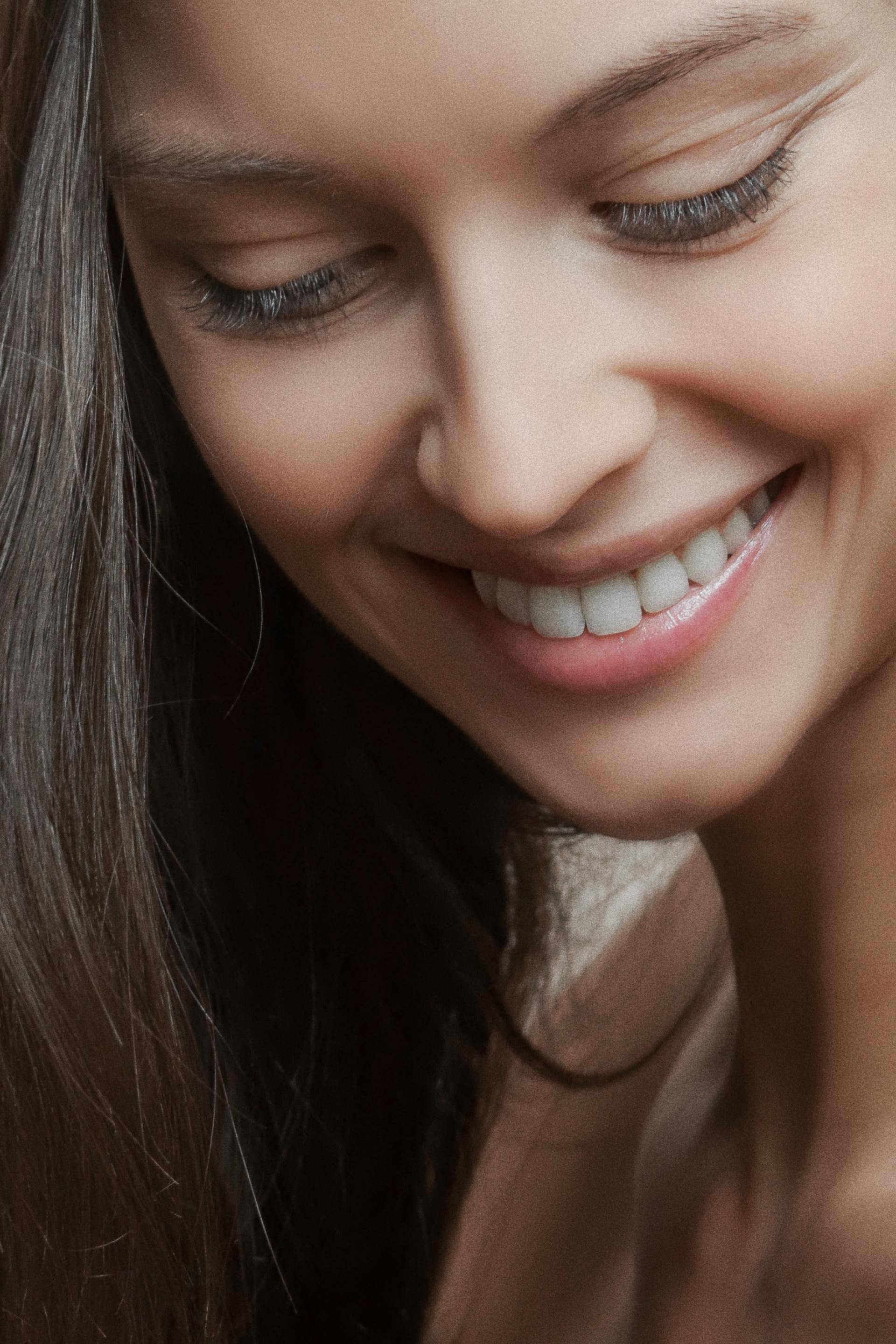 woman smiling | root canals in Boulder, CO 80304