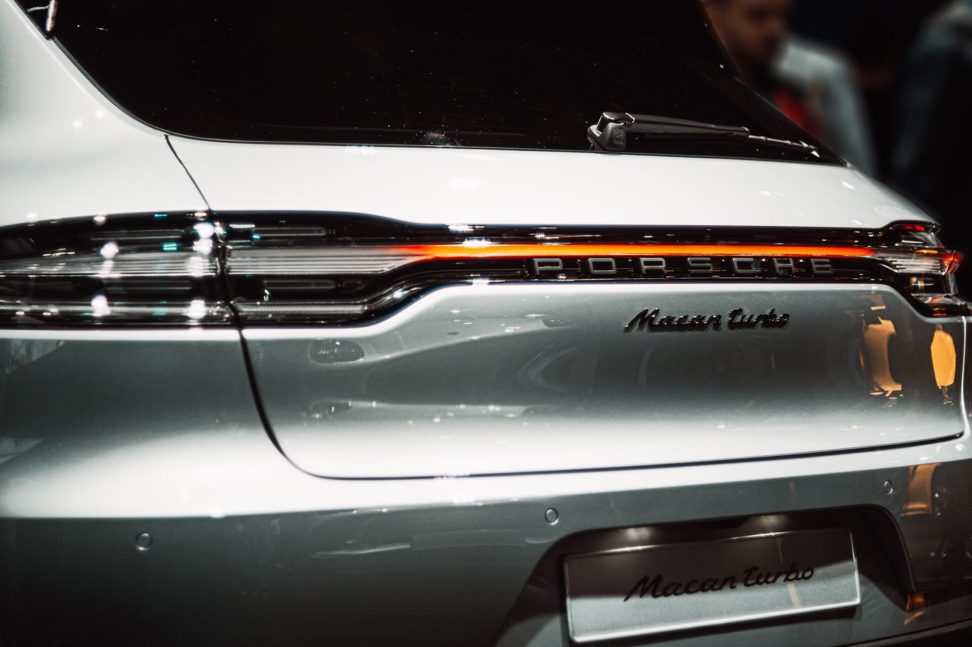 white Porsche Macan Turbo rear end