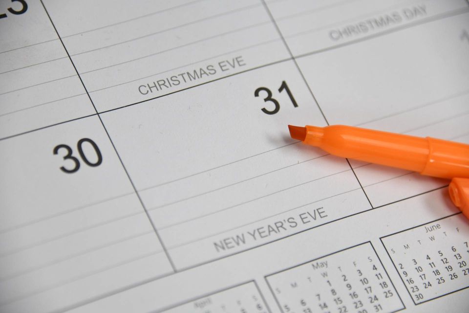 blank calendar showing Dec 30 and 31 with orange marker