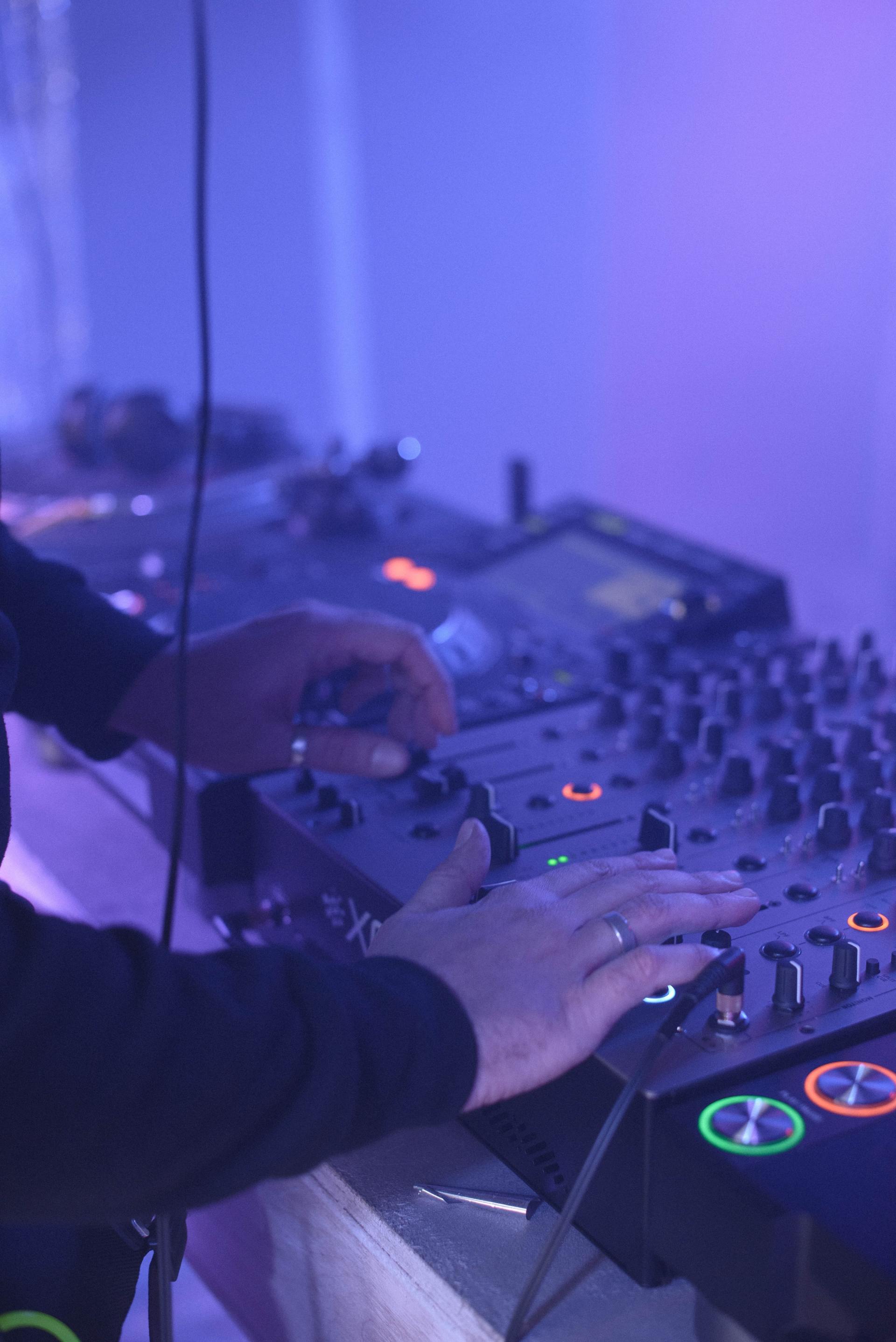 DJ at work running is DJ equipment