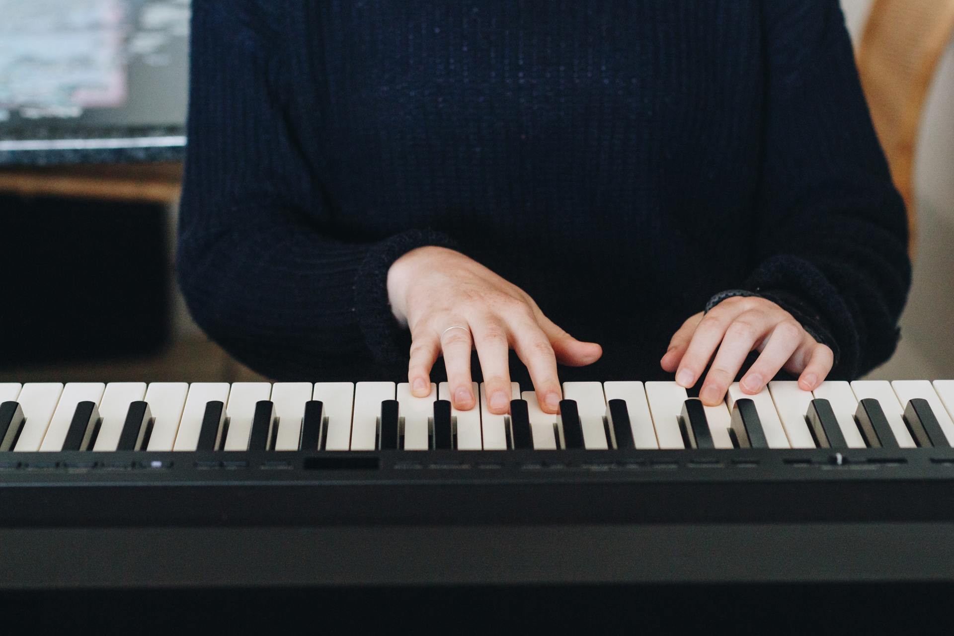 Hands on an Organ Keyboard