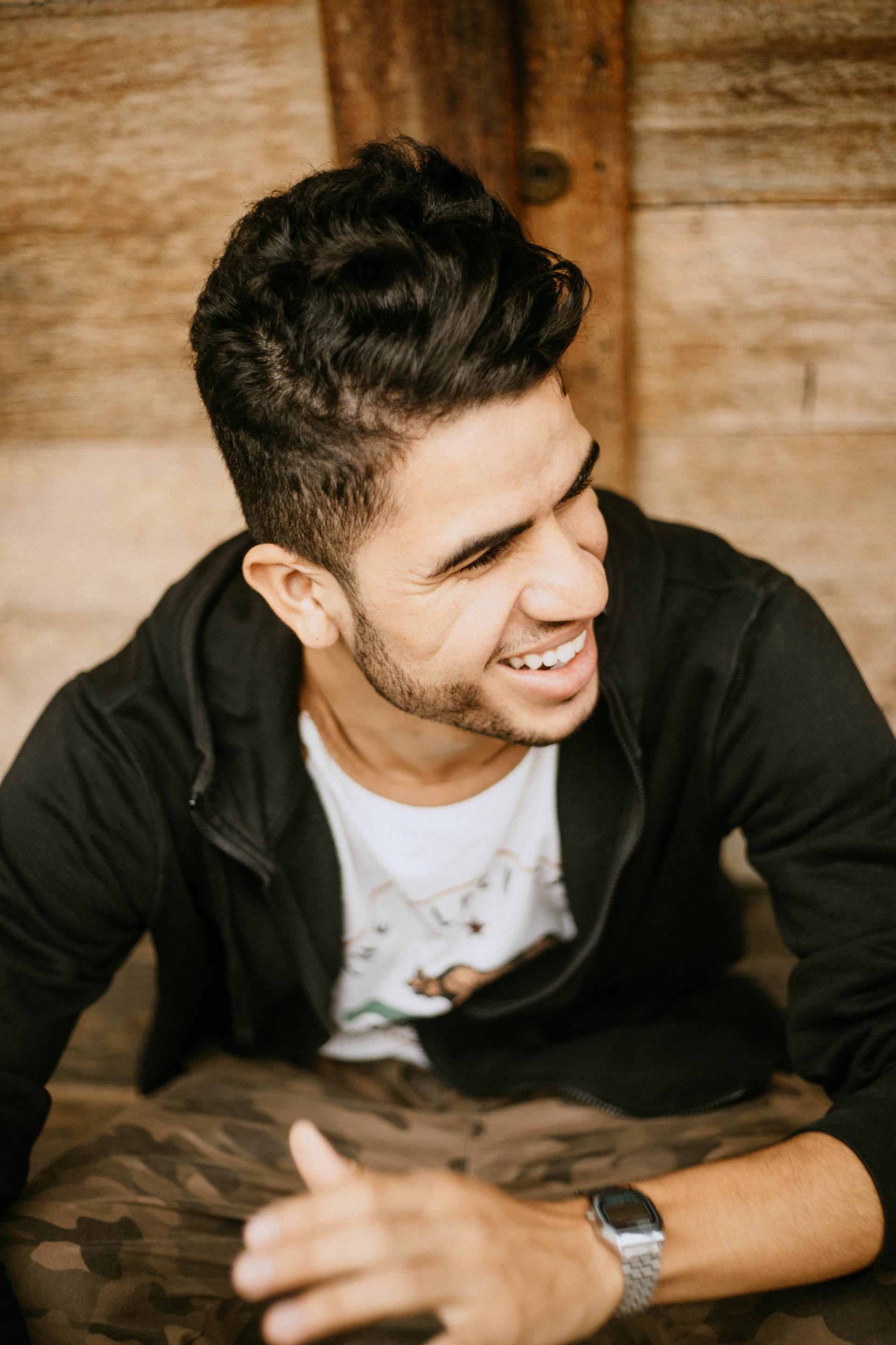 man smiling after teeth cleaning and whitening in Lawrence KS 66049