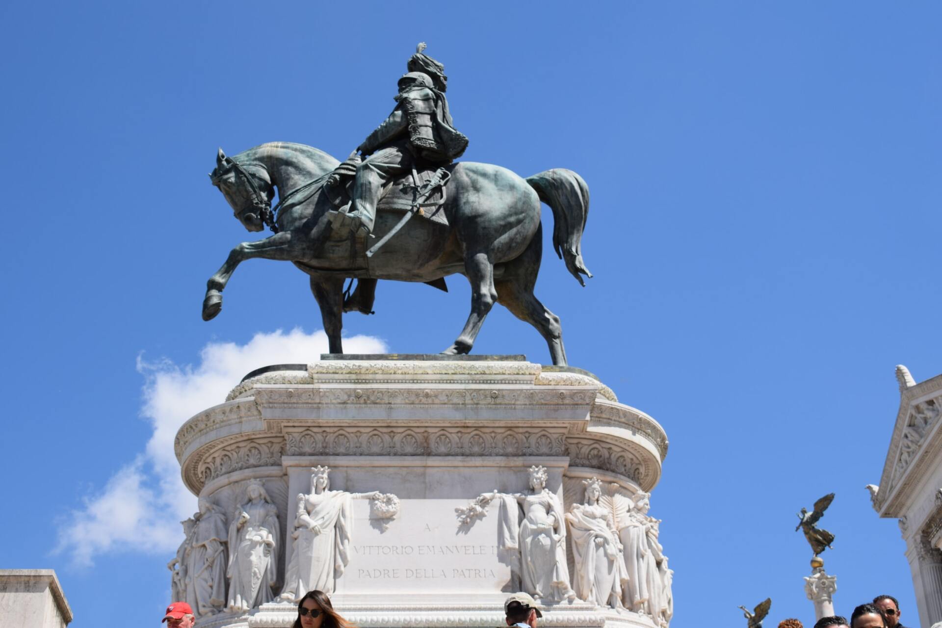 A statue of a man riding on the back of a horse.