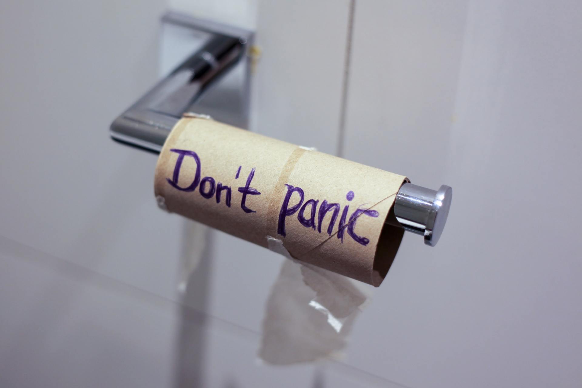 empty toilet paper roll with words written on it , 