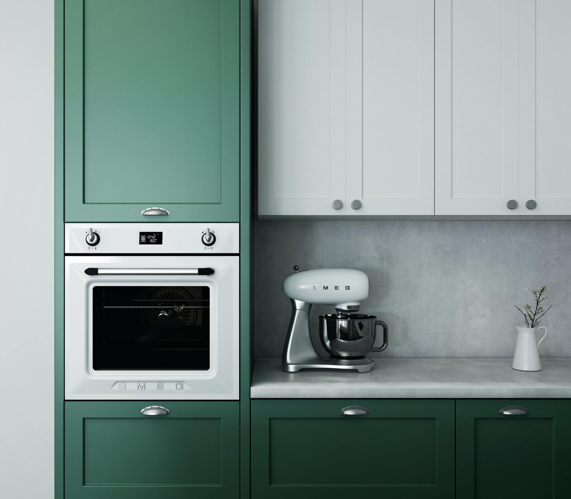 A kitchen with green cabinets , white cabinets , a mixer and an oven.