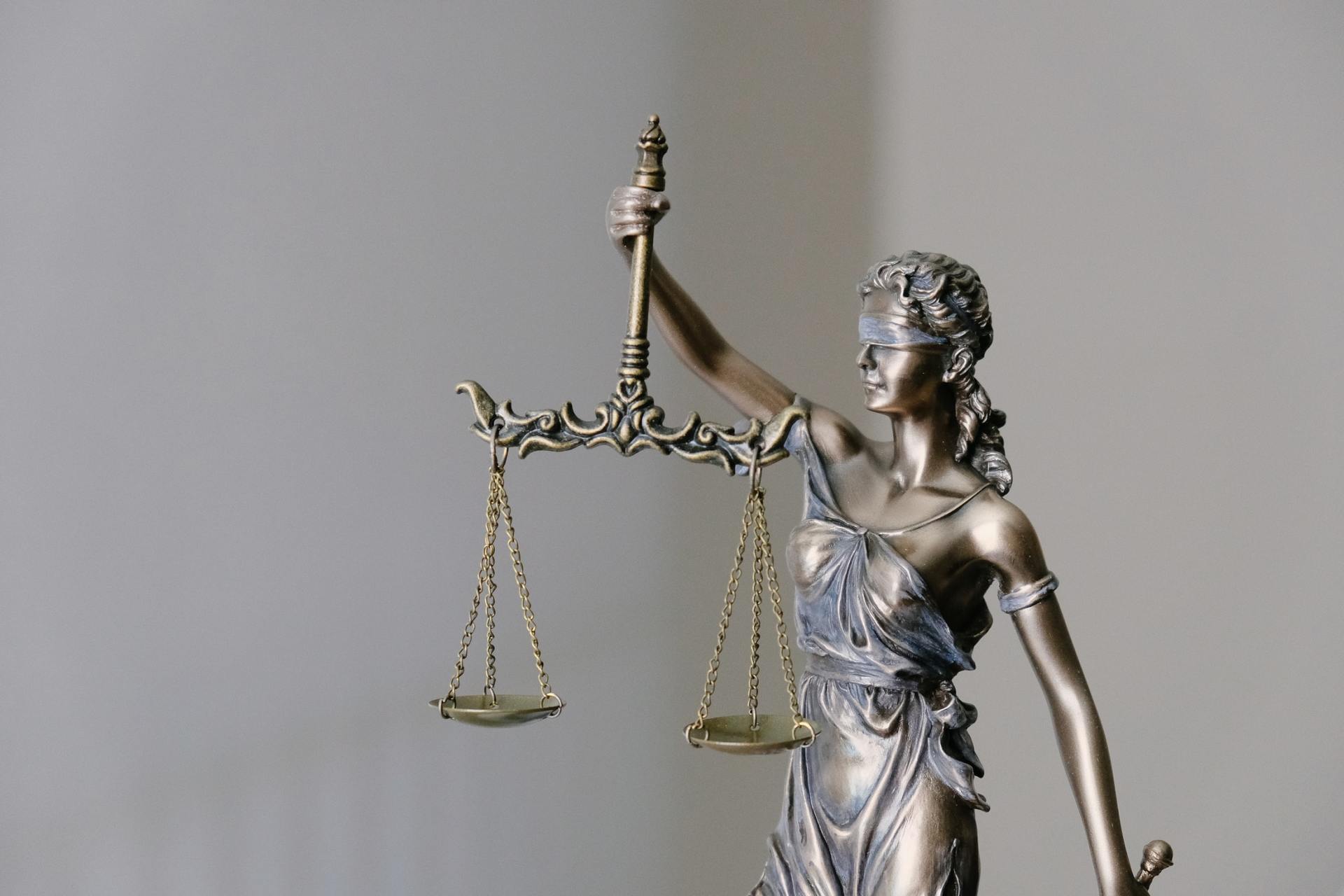 lady holding scales of justice