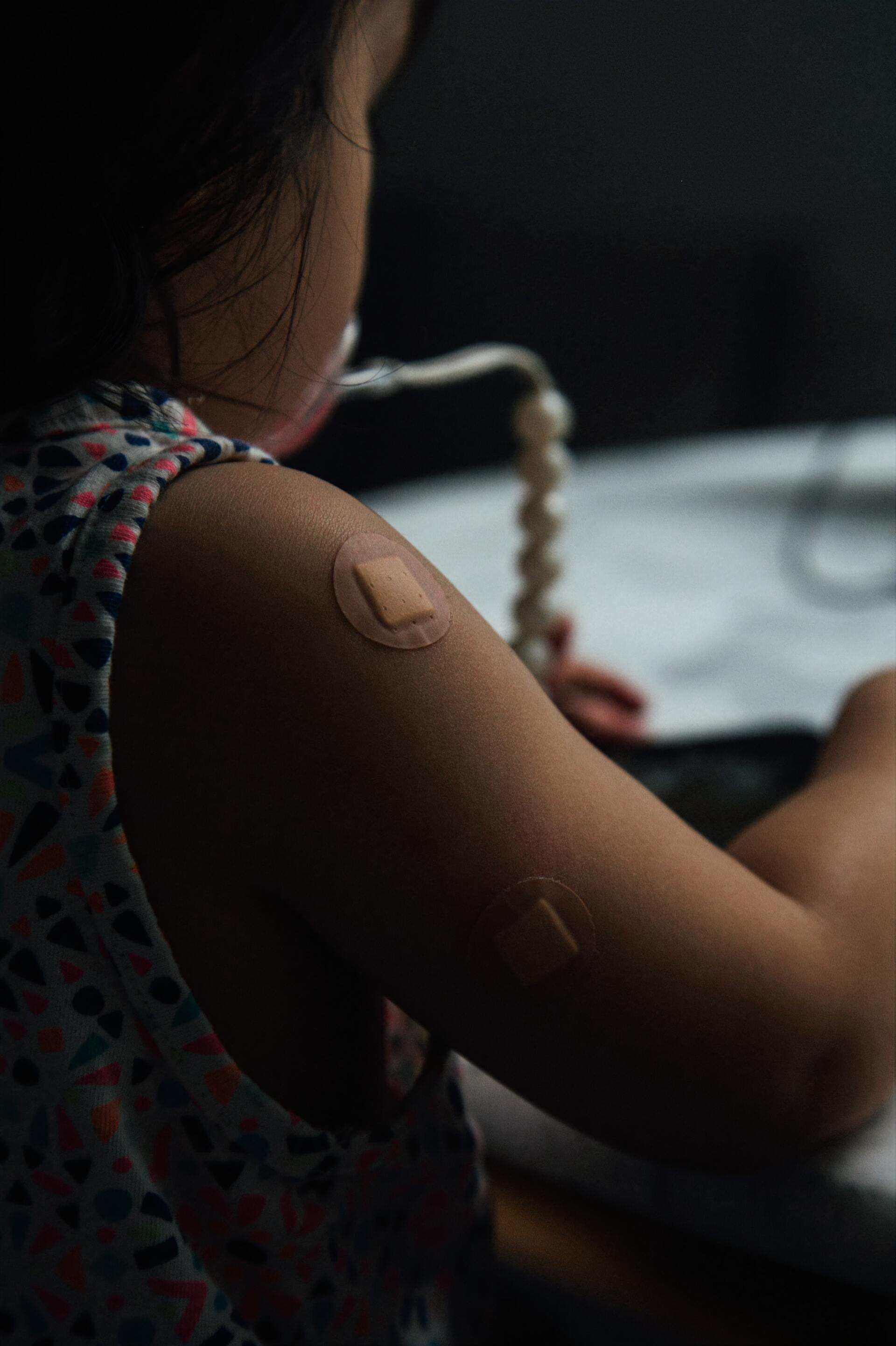 Child with Band-Aid After Flu Shot
