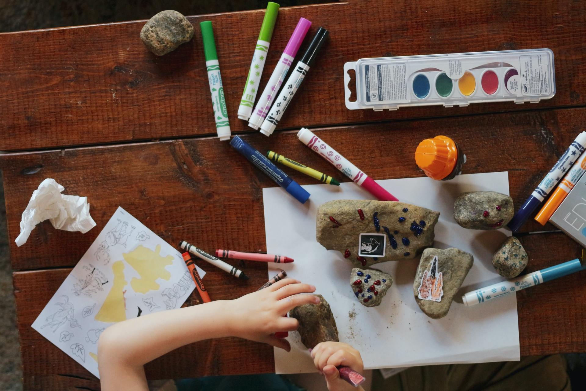 Art materials on a wooden table