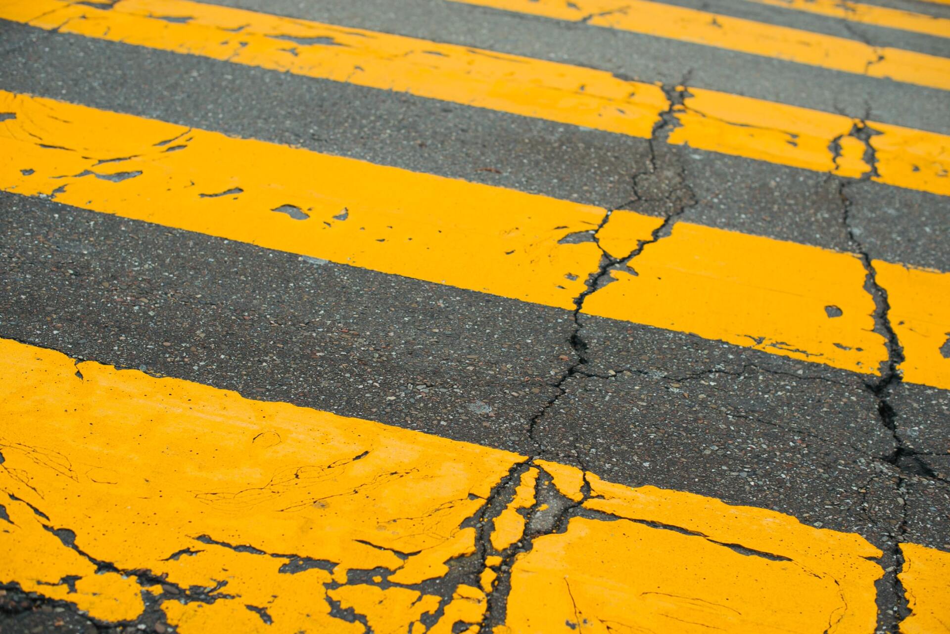 Picture of cracked asphalt road in need of asphalt repair