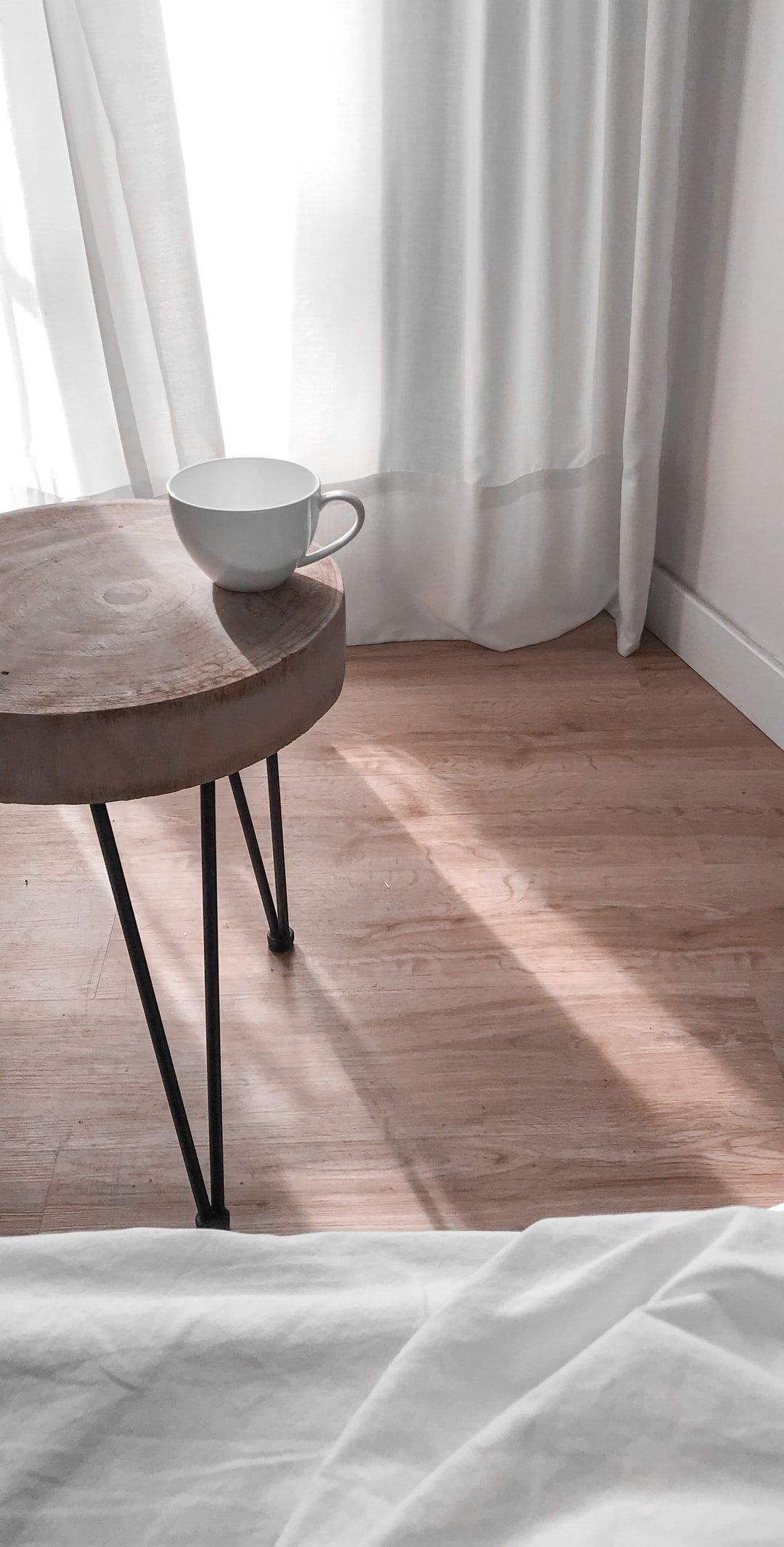 Table With Mug on Wooden Floor