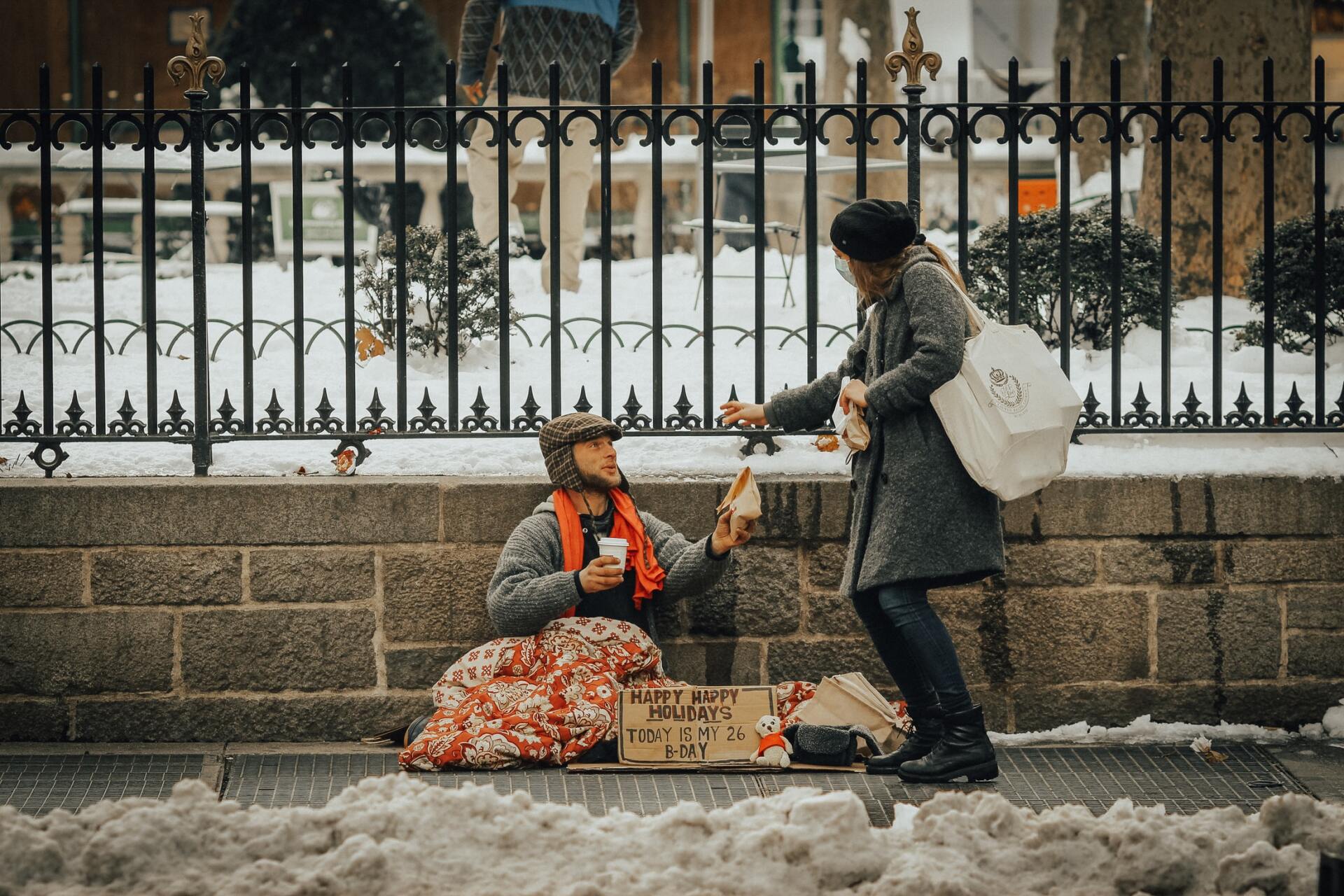 A women giving a man food