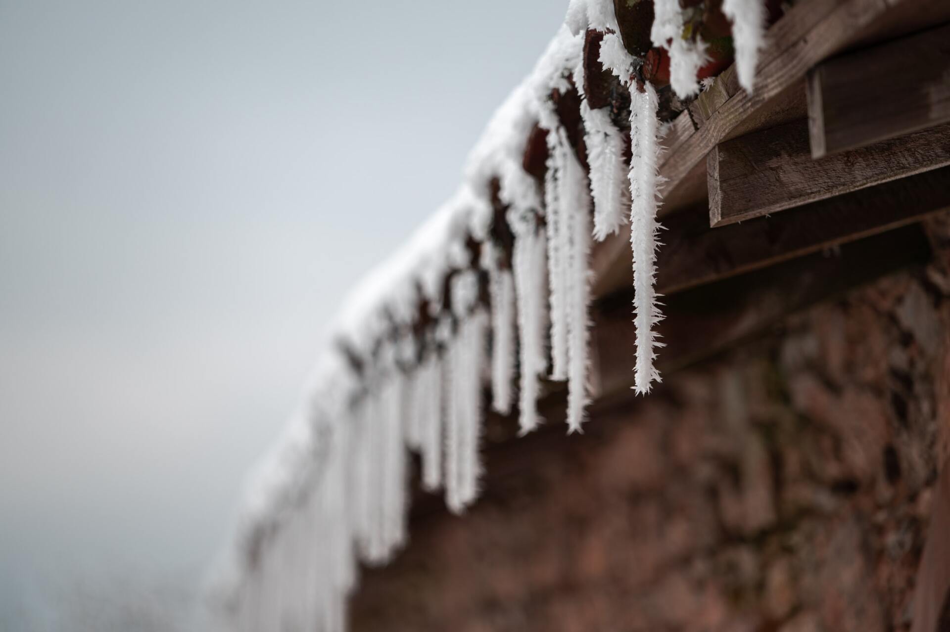 icicles hanging off of roof