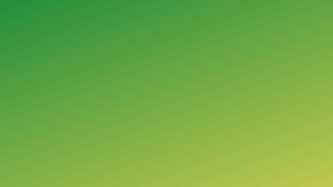A green and yellow gradient background that looks like a leaf.